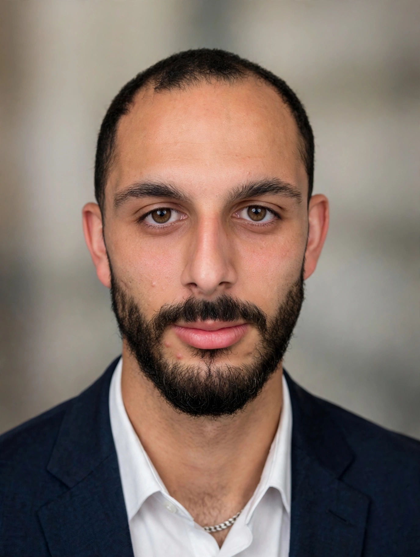 Professional headshot of Guy Zarafshan